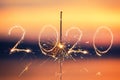 Bengal light on the sunset background, New Year with sparklers sparks on a sunset background Royalty Free Stock Photo