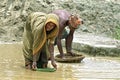 Bengal old women and man working in gravel quarry Royalty Free Stock Photo