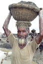 Bengal older man working in gravel pit Royalty Free Stock Photo