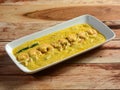 Bengali Dish or Food - Delicious authentic Bengali Prawn Malai Curry also known as chingri malai curry served on a ceramic white Royalty Free Stock Photo