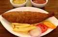 Bengali Fish Fry served with Mustard and Tomato Sauce Royalty Free Stock Photo