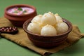 Bengali sweetness Rasgulla, a famous Indian sweet in clay