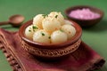 Bengali sweetness Rasgulla, a famous Indian sweet in clay