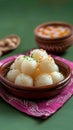 Bengali sweetness Rasgulla, a famous Indian sweet in clay