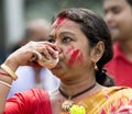 Bengali women performing Durga Puja