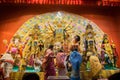 Bengali women worshipping Goddess Durga at Puja pandal, Kolkata, West Bengal, India.