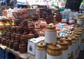 Ceramic jars containers displayed on the street.