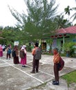 Bengkalis, Riau - July, 14 2021:situation during the pandemic, some students are queuing to wash their hands before go home