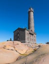 BengtskÃ¤r Lighthouse, summer view of Bengtskar island in Archipelago Sea, Finland, KimitoÃ¶n, Gulf of Finland sunny day Royalty Free Stock Photo