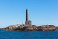 BengtskÃ¤r Lighthouse, summer view of Bengtskar island in Archipelago Sea, Finland, KimitoÃ¶n, Gulf of Finland sunny day Royalty Free Stock Photo