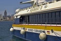 Benidorm Poniente beach and touristic tour boat in the harbor