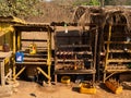 Primitive street gas station. Fuel is sold from the bottles