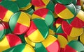 Benin Badges Background - Pile of Beninese Flag Buttons. Royalty Free Stock Photo