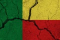 Benin flag on the cracked earth