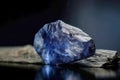 Benitoite is a rare precious natural stone on a black background. AI generated. Header banner mockup with space. Royalty Free Stock Photo