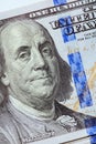 Benjamin Franklin closeup face is featured on United States one hundred dollar bill, which a prominent currency