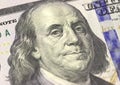 Benjamin Franklin face on US hundred or 100 dollars bill macro, united states money closeup. Royalty Free Stock Photo