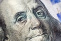 Benjamin Franklin face on us one hundred dollar bill macro , united states money closeup Royalty Free Stock Photo