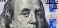 Benjamin Franklin face on us one hundred dollar bill macro isolated, united states money closeup Royalty Free Stock Photo