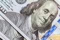 Benjamin Franklin face on us one hundred dollar bill macro at United States money closeup