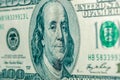 Benjamin Franklin`s face in close-up on a US hundred dollar bill Royalty Free Stock Photo