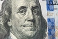 Benjamin Franklin\'s face on the US 100 dollar bill. Franklin on one hundred dollar. Detail of Portrait on One Hundred Dollar Royalty Free Stock Photo