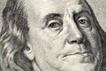 Benjamin Franklin`s portrait on one hundred 100 american dollar bill. Macro close up view Royalty Free Stock Photo