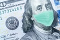 Benjamin Franklin With Worried and Concerned Expression Wearing Medical White  Face Mask On One Hundred Dollar Bill Royalty Free Stock Photo