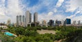 Benjasiri park in Sukhumvit district. Panorama of financial dist