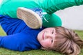 Bent girl lying on her back Royalty Free Stock Photo