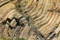 Bent hexagonal columns of volcanic origin at the Hong Kong Global Geopark in Hong Kong, China. Royalty Free Stock Photo