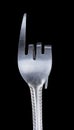 Bent metal fork, pointer. Royalty Free Stock Photo