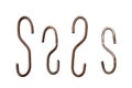 Group of rusty s shaped metal hooks