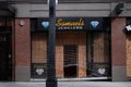 Bent security gate in front of a jewelry store during May 30, 2020 riots