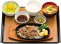 Bento of beafsteak with rice and seaweed soup on table Royalty Free Stock Photo