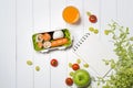 Bento box with different food, fresh veggies and fruits