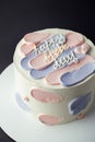 Bento Cake With Blue And Pink Cream Cheese Frosting And Happy Birthday Text On Top. Birthday Cake On A Gray Background