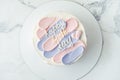 Bento Cake With Blue And Pink Cream Cheese Frosting And Happy Birthday Text On Top. Birthday Cake On White Background
