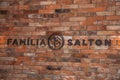 Company sign on brick wall at Salton Winery