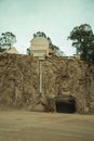 Rocky cliff and equipment in a quarry