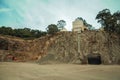 Rocky cliff and equipment in a quarry