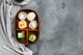 Bento sushi roll, on gray stone background, top view flat lay , with copyspace  and space for text Royalty Free Stock Photo