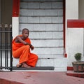 BENTOTA, SRI LANKA - 27 APR 2013: Young Buddhist monk sits on a