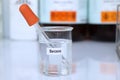 Benzene in container, chemical analysis in laboratory