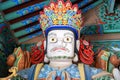 Beomeosa temple guard. A colorful painted statue in entrance door in Busan, South Korea.