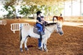 Ber Yakov, Israel - September 21, 2016: Horse riding lessons for kids. Royalty Free Stock Photo