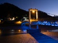 Modern Suspension Bridge Lit with Blue and Gold over the Osum River in Berat Albania