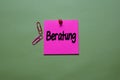 Beratung write on a sticky note isolated on office desk. German Language it means Consulting