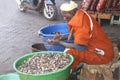 Portrait of a Berber man selling snails, Marrakech, Marocco