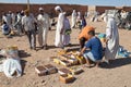 Berber men at the dates fruit market Royalty Free Stock Photo